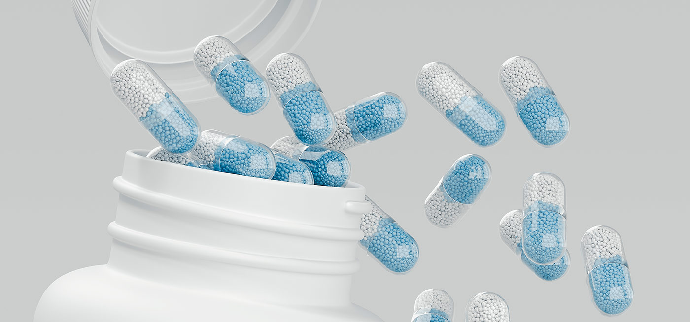 Capsules spilling from a bottle